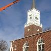 The cross is once again on the steeple.